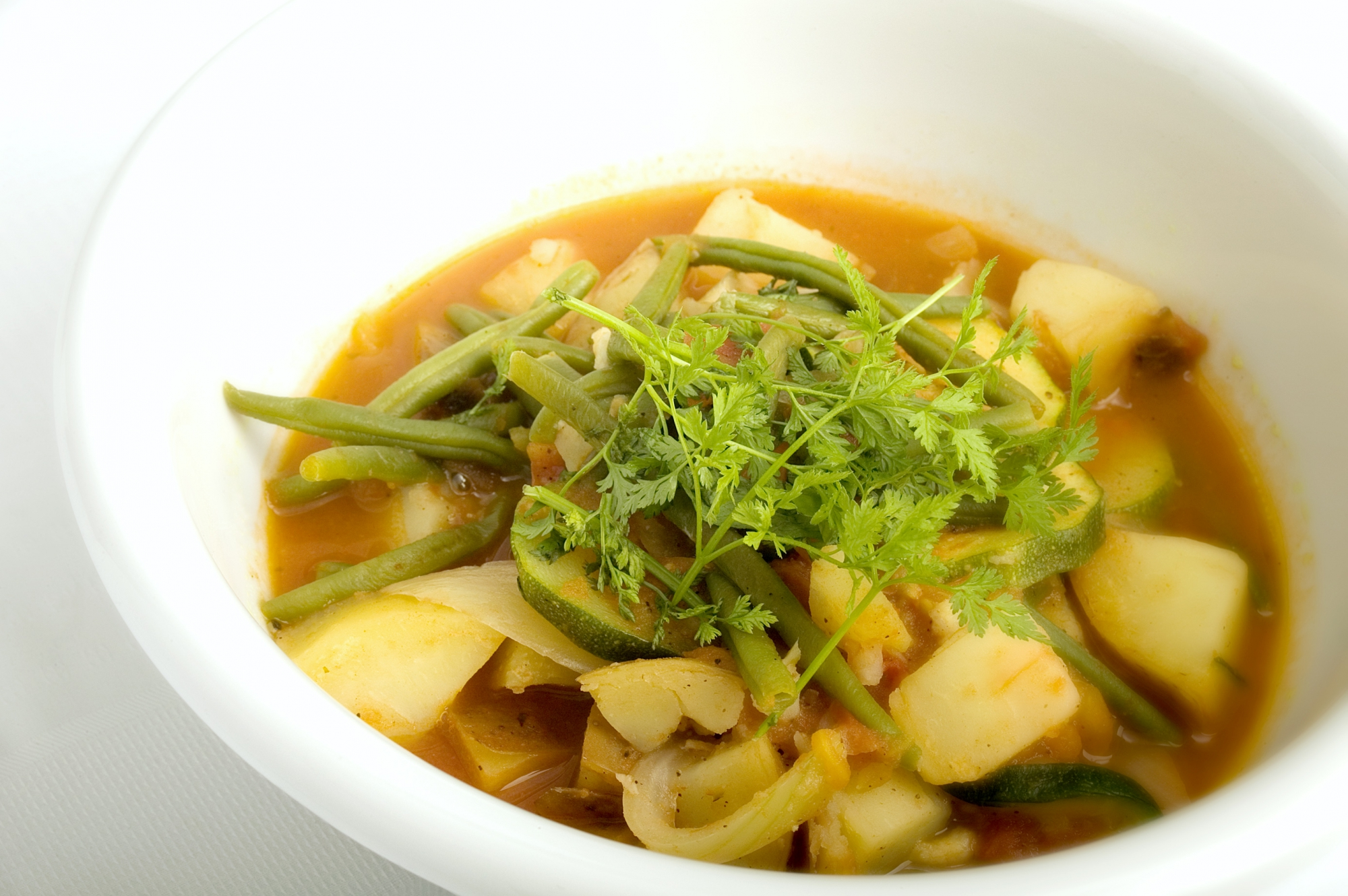 Gryderet med grønne bønner, kartofler og squash